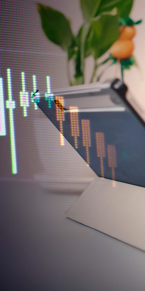 A man with a model of a house on the background